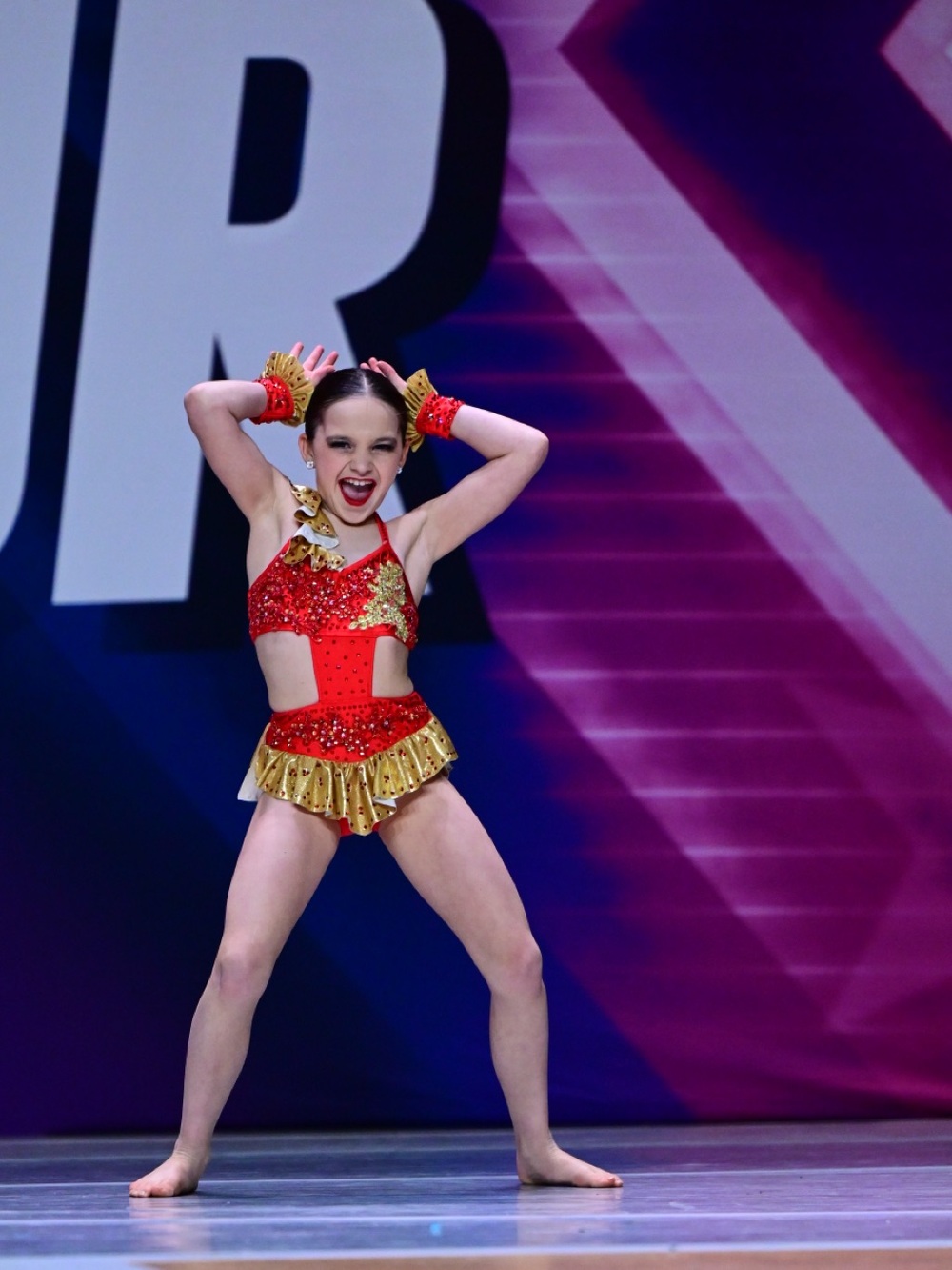 Bedazzled Red and Gold Sequin Dance Costume with Ruffled Skirt